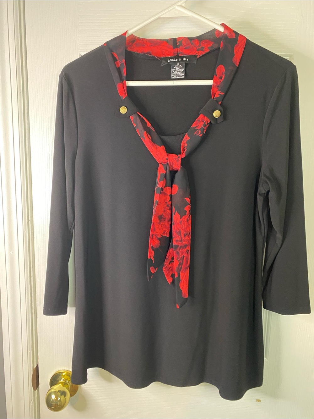 Adele &May Black Top with Red Floral Tie Accent Size Medium.